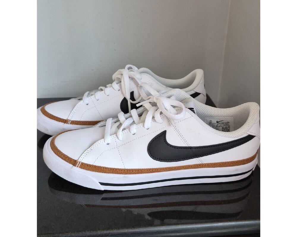 Nike Boy's Size 5Y White Sneakers with Black Swoosh and Brown Accent